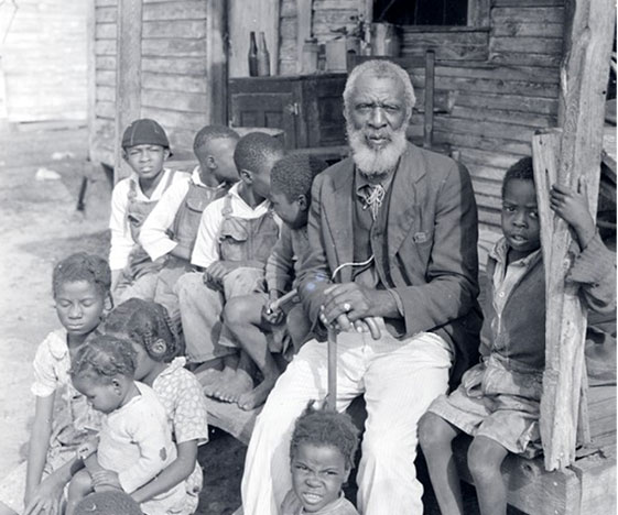 Doug Ambrose with Children, 1938